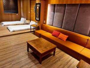 Ein Bett oder Betten in einem Zimmer der Unterkunft 輕塵別院Serenegray B&B