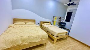 Katil atau katil-katil dalam bilik di Hoemstay in Klang for Event , Gathering , Wedding , etc