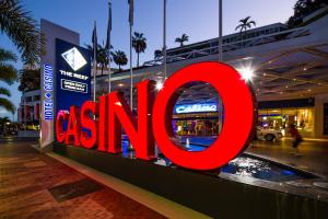 a sign that says asimo on the side of a building at Pullman Reef Hotel Casino in Cairns +76 photos