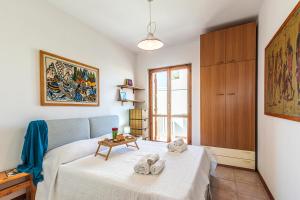 Postel nebo postele na pokoji v ubytování Coral House with Shared Pool and Sea View + 42 fotografií