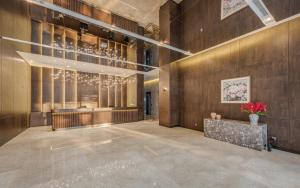 Postel nebo postele na pokoji v ubytování Grand Mansion