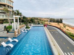 Πισίνα στο ή κοντά στο 1BR direct seaview - 5 mins to the beach - infinity pool - Apec Mui Ne +31 φωτογραφίες