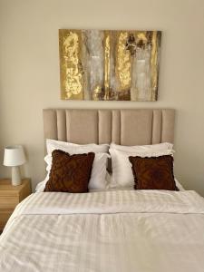 Postel nebo postele na pokoji v ubytování Cozy Corner Mini Villa