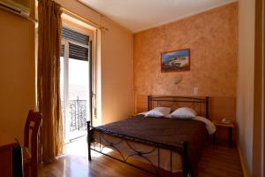 Postel nebo postele na pokoji v ubytování Electra Hotel Piraeus