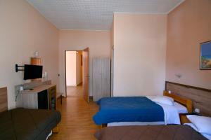 Postel nebo postele na pokoji v ubytování Electra Hotel Piraeus