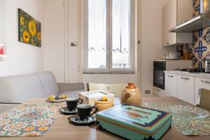 Η κουζίνα ή μικρή κουζίνα στο Ai quattro canti di città, appartamento in centro +23 φωτογραφίες