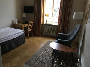 TV a/nebo společenská místnost v ubytování First Hotel City Eskilstuna