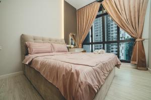 a bedroom with a large bed and a large window at Sky88 De Next 2br4pax Near CIQ KSL Midvalley by Our Stay in Johor Bahru +43 photos