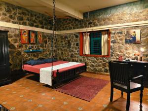 a bedroom with a swing bed in a room at Fifth Estate in Vagamon +33 photos