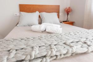 Cama o camas de una habitación en Pensión Casa Castelao 31 O Grove