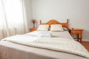 Cama o camas de una habitación en Pensión Casa Castelao 31 O Grove
