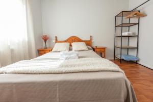 Cama o camas de una habitación en Pensión Casa Castelao 31 O Grove
