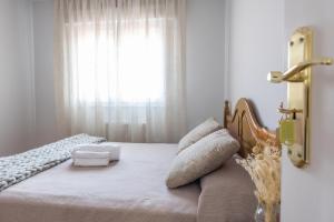 Cama o camas de una habitación en Pensión Casa Castelao 31 O Grove