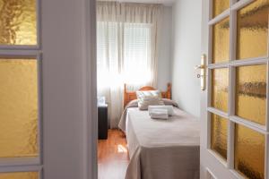 Cama o camas de una habitación en Pensión Casa Castelao 31 O Grove