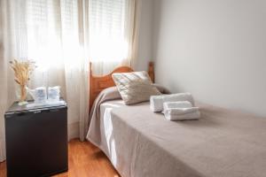 Cama o camas de una habitación en Pensión Casa Castelao 31 O Grove