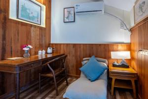 Letto o letti in una camera di Pillow Window & Listen to Rain Hostel Museum Branch Pingjiang Road, Suzhou