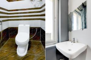 Koupelna v ubytování Super Hotel O VEDHANSHI HOTELS BHONGIRI.