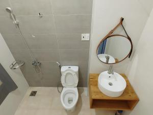 Ένα μπάνιο στο Double room bancony at sol homesay