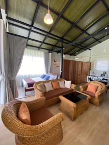 Posezení v ubytování Sattee's Home บ้านพักเศรษฐี