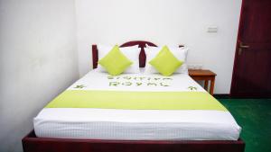 Letto o letti in una camera di Sigiriya Royal Resort