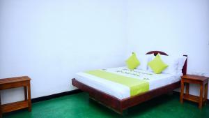 Letto o letti in una camera di Sigiriya Royal Resort