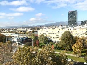a view of a city with buildings and trees at COZY PLACE NEAR BUS AND RAILWAY STATION with common kitchen, bathroom and toilet in Zagreb