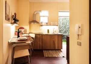 a kitchen with a sink and a counter top at BmyGuest - Santa Catarina Light Apartment in Porto