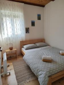 Postel nebo postele na pokoji v ubytování Šumski Miro + 19 fotografií