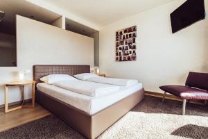 Postel nebo postele na pokoji v ubytování Hotel Birkenhof