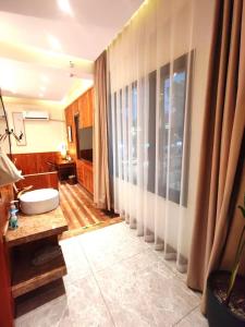 Letto o letti in una camera di Pillow Window & Listen to Rain Hostel Museum Branch Pingjiang Road, Suzhou