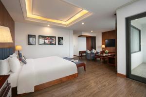 Postel nebo postele na pokoji v ubytování Bamboo Sapa Hotel