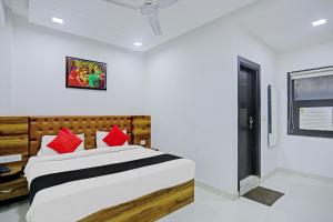 Postel nebo postele na pokoji v ubytování Hotel O ZION