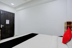 Postel nebo postele na pokoji v ubytování Hotel O ZION