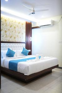 Letto o letti in una camera di Mysore Elite