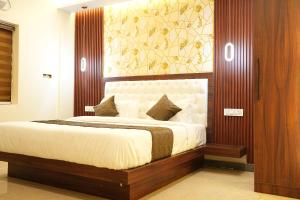 Letto o letti in una camera di Mysore Elite