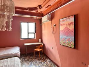 Cama o camas de una habitación en 浪子小栈 Kashgar Ancient City