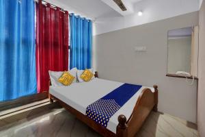 Foto Bangalore’is asuva majutusasutuse SPOT ON Canton Lodging And Boarding galeriist