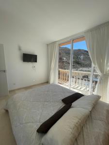 En eller flere senge i et værelse på Luxury duplex-direct ocean view