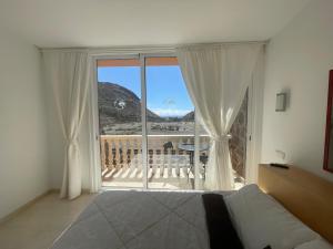 En eller flere senge i et værelse på Luxury duplex-direct ocean view + 14 billeder