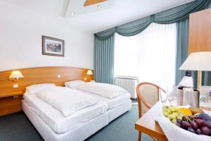 Ein Bett oder Betten in einem Zimmer der Unterkunft Gasthof Tepferdt