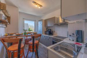ครัวหรือมุมครัวของ Neue Ferienwohnung Die Piratenbucht Ostsee
