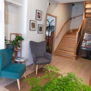 Posezení v ubytování Hotel Les Alpes