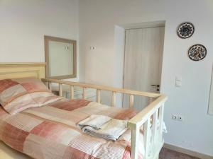 Posteľ alebo postele v izbe v ubytovaní Alexandros Traditional House