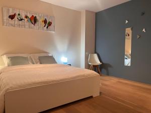 Postel nebo postele na pokoji v ubytování vakantiewoning Baaltje
