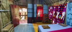 Postel nebo postele na pokoji v ubytování Jungle House Kep