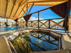 a room with a large pool of water in a building at Girskyi Kutochok in Verkhovyna