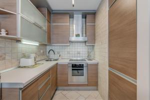 Kuchyňa alebo kuchynka v ubytovaní Apartment Stiv Luxe