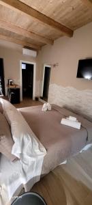 Postel nebo postele na pokoji v ubytování Criba Rooms