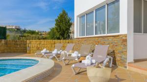 Bazén v ubytovaní Villa Asunción Benalmádena by Ruralidays alebo v jeho blízkosti