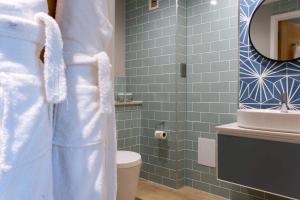 Um banheiro em Captain's Club Hotel & Spa